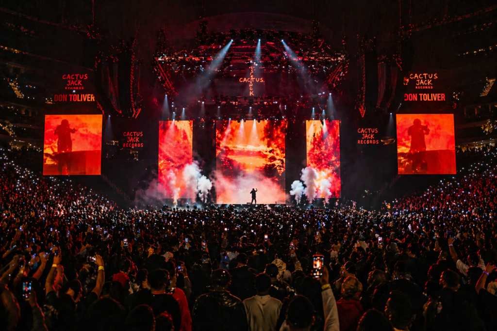Cactus Jack Records artist performing at a packed arena tour stop