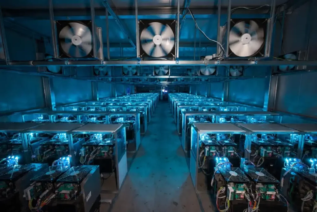 Industrial Bitcoin mining facility showing rows of mining rigs in 2026
