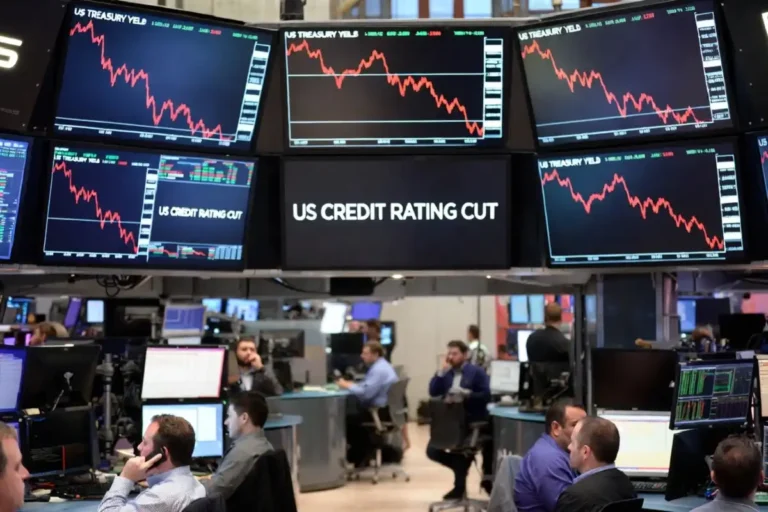 Moody's downgrade of US credit rating reflected on Wall Street trading floor screens May 2026