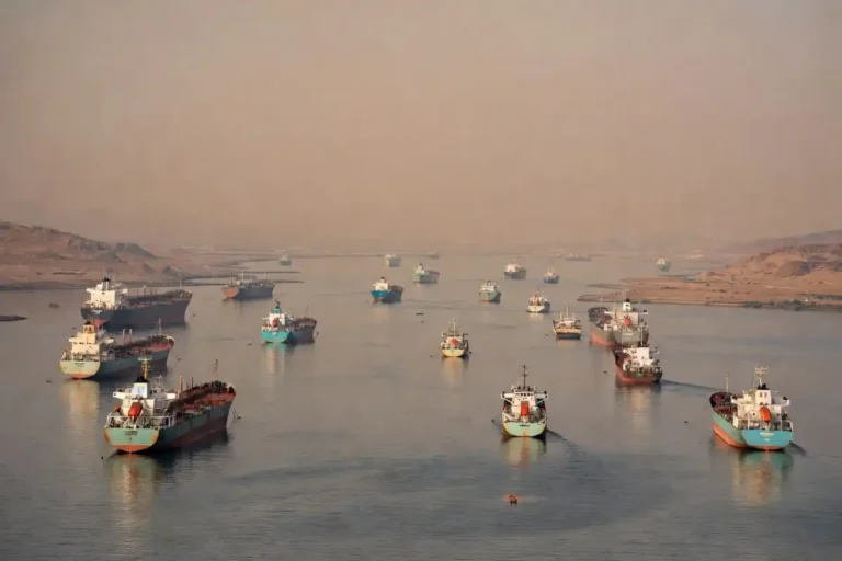 Cargo ships anchored in the Strait of Hormuz during the 2026 US-Iran conflict and peace talks