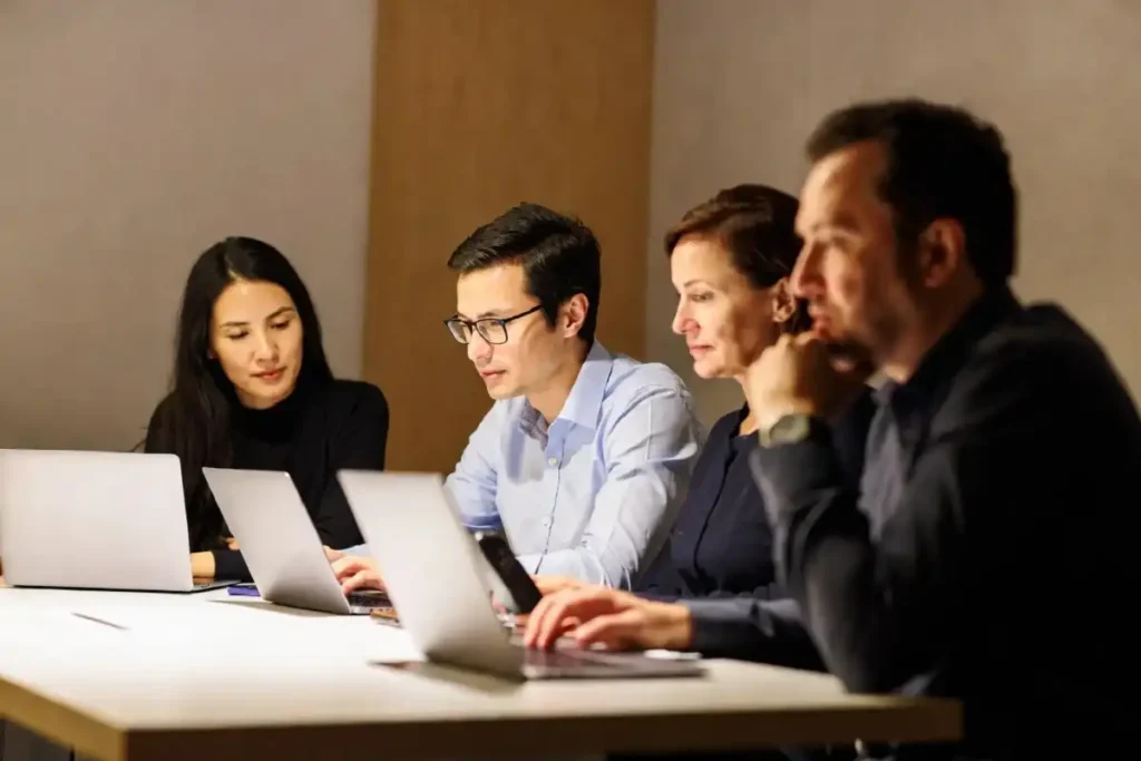 Business professionals in a meeting discussing career development and growth strategies