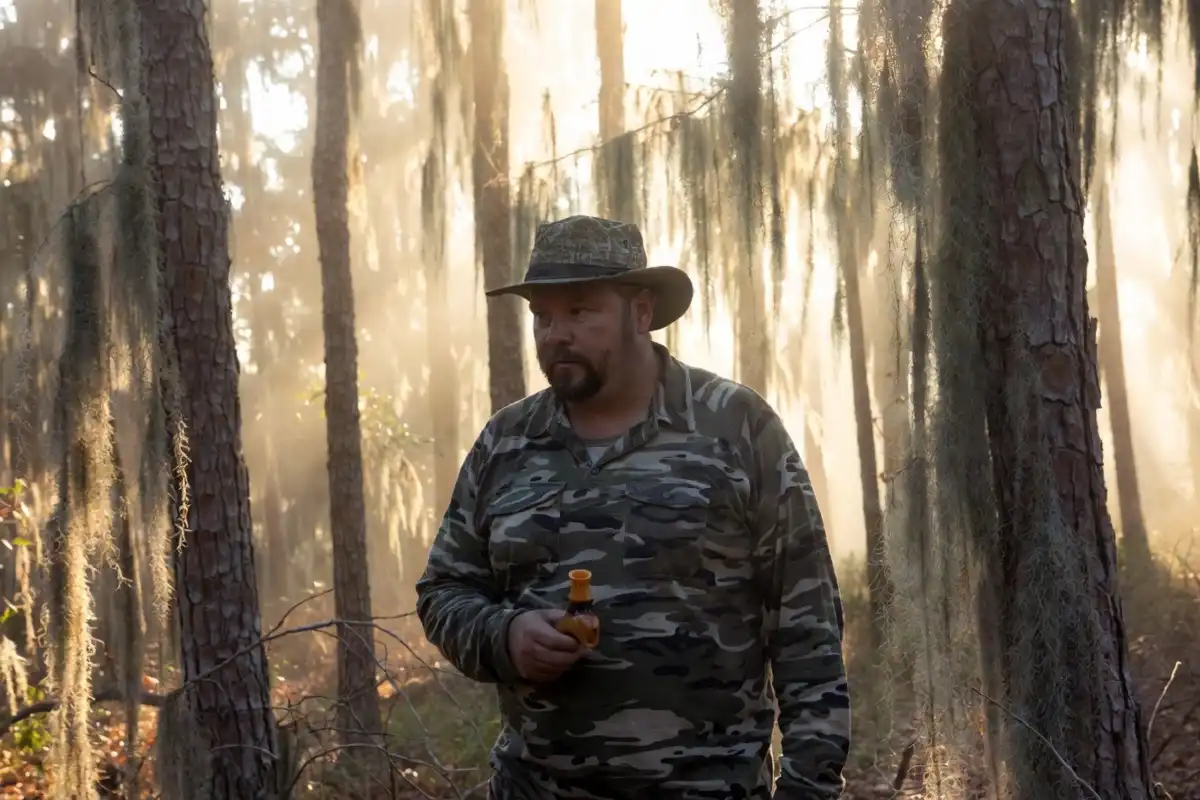 Will Primos, founder of Primos Hunting, posing outdoors in hunting gear
