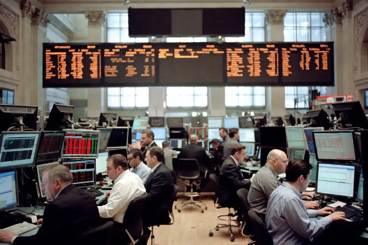 Traders react on the New York Stock Exchange floor as CEO confidence falls in Q2 2026