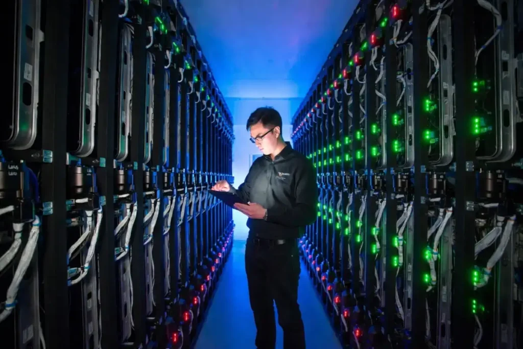 System administrator applying kernel security patches across a row of Linux servers