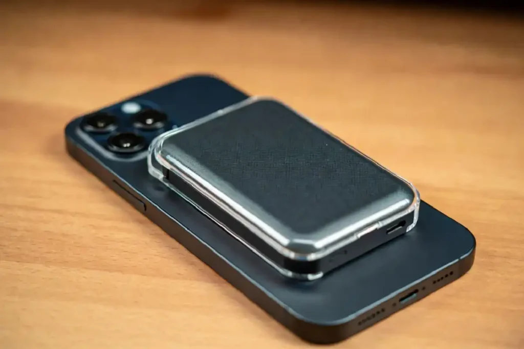 MagSafe wallet and power bank snapped onto back of iPhone in 2026